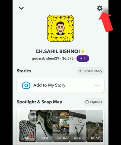 Look for the settings icon on snapchat