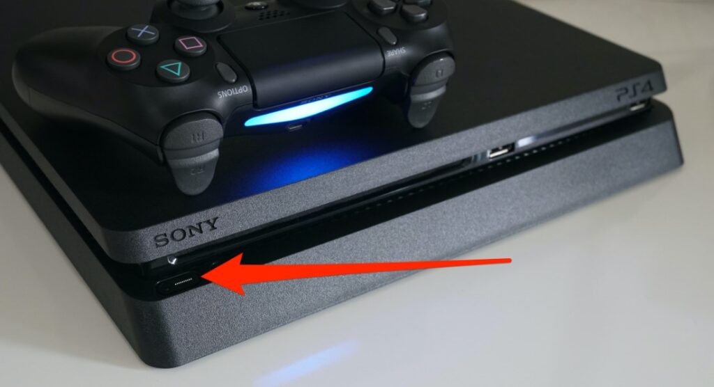 Press and hold the PS4 Power button until